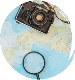 Map, old-fashioned camera, magnifying glass